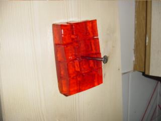 orange_jelly_nailed_to_wall